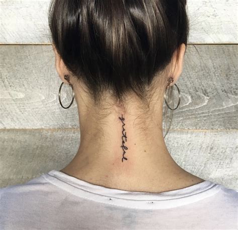 back of neck tattoo women|small neck tattoos female.